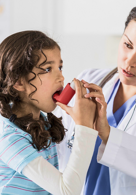 Doctor examining child
